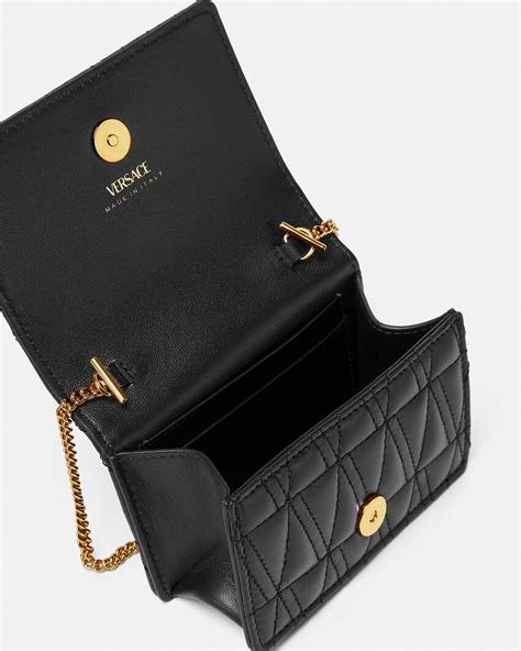 versace virtus micro bag|Versace quilted leather bag.